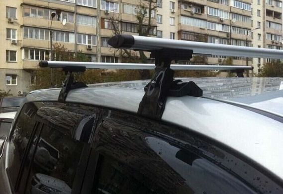 Багажник Kia Carens 2013-2020 mk IV MPV Amos Dromader Wind на гладкий дах, Аєродинамічна