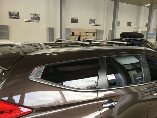 Поперечки Mitsubishi Pajero Sport 2015+ на інтегровані рейлінги, Хром, Овальна