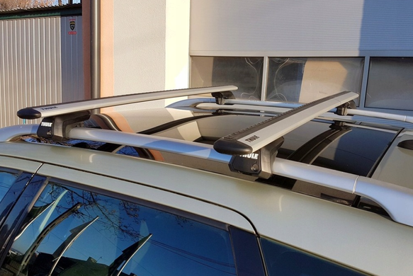 Багажник VAUXHALL Astra 1998-2009 (G); mk II; універсал Thule Wingbar Evo на рейлінги з просвітомхром, Хром